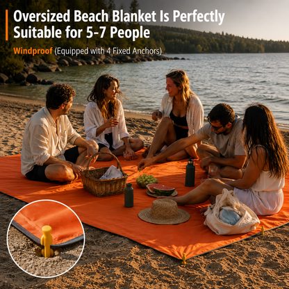 "SandFree waterproof beach blanket laid out on sandy beach"